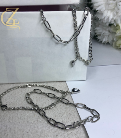 The "Attraction" Set: Magnetic Heart & Mixed Link Couple’s Bracelets Street-Luxe Pair: Silver Paperclip & Curb Chain Magnetic Set Connected Chains: Unisex Magnetic Heart Link Bracelet Pair The Bond Set: Industrial Mixed-Chain Matching Bracelets