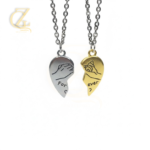 High-quality lifestyle photography of beautiful couple's jewelry, showing the 'Forever' split heart design on soft, elegant hands to highlight the product's fit and romantic appeal.