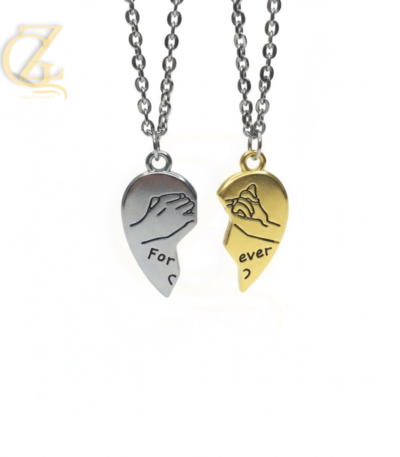 High-quality lifestyle photography of beautiful couple's jewelry, showing the 'Forever' split heart design on soft, elegant hands to highlight the product's fit and romantic appeal.