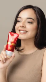 Close-up of a model's radiant skin showing the natural coverage and glow of BB Block Tinted Sunscreen.