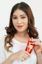 Close-up of a model's radiant skin showing the natural coverage and glow of BB Block Tinted Sunscreen.