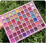 63-colors matte and shimmer eyeshadow palette in cool blue and purple tones.